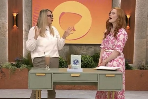 Jade presenting Forest Floor live on a TV shopping channel set
